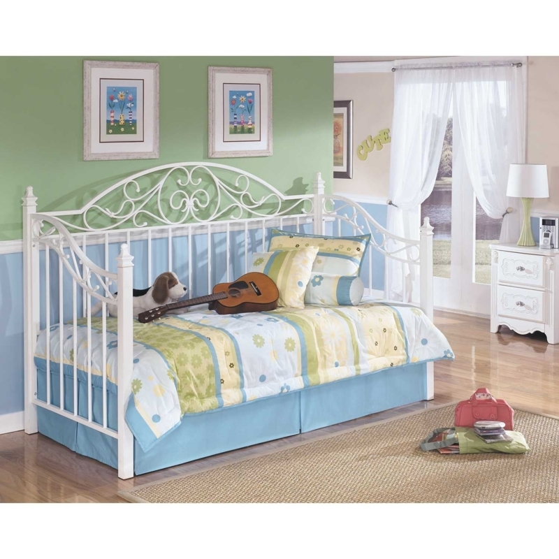 Ornate White Guest Bed with Spindle Pickets and Scrollwork