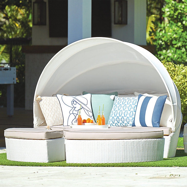 Outdoor Wicker Daybed with Retractable Canopy and Curved Silhouette