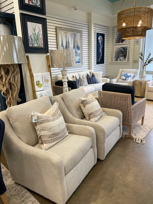 Pair of Cream Swivel Chairs with Coastal Striped Fringe Pillows