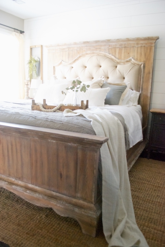 Panel Bed with Ornate Scrollwork Carvings and Turned Posts