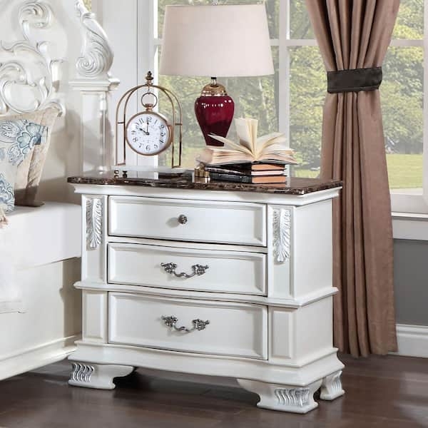 Pearl White Nightstand featuring a Stone-Like Top and Ornate Carvings