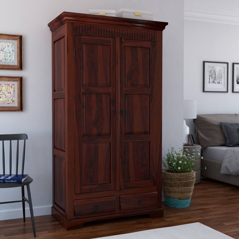Rustic Clothing Armoire with Fluted Frieze Detail and Paneled Doors
