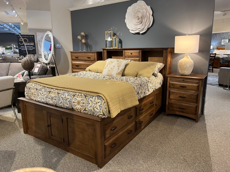 Storage Bed featuring Sliding Door Compartment and Cabinet Footboard