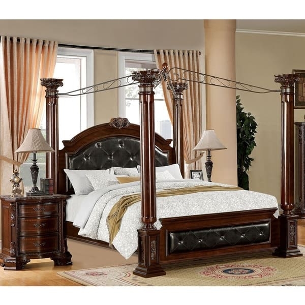 Traditional Canopy Bed with Ornate Metal Scrollwork and Tufted Upholstery