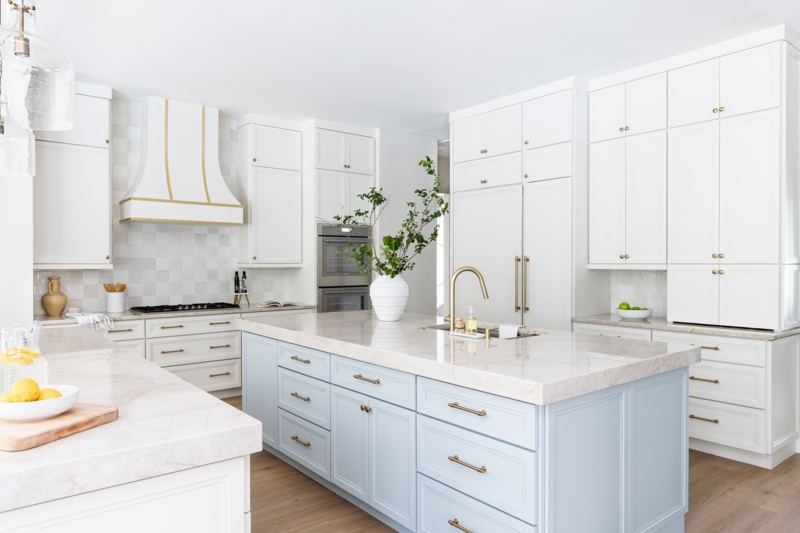 Transitional Kitchen Design with Light Blue Island and Gold Hood