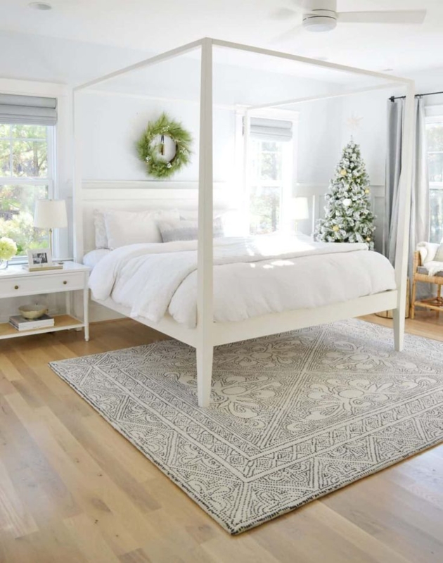 Transitional White Canopy Bed Frame with Minimalist Silhouette