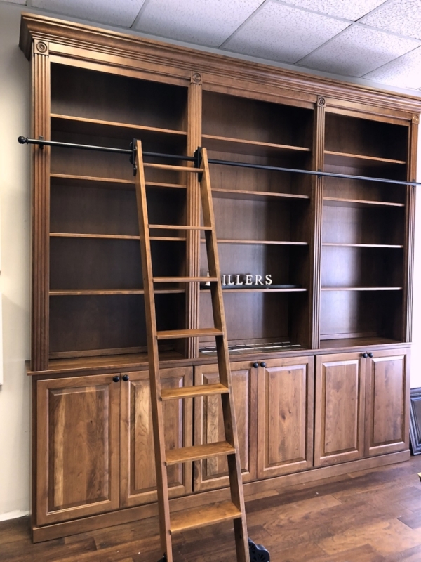 Warm Wood Bookcase with Rolling Ladder and Traditional Fluted Pilasters
