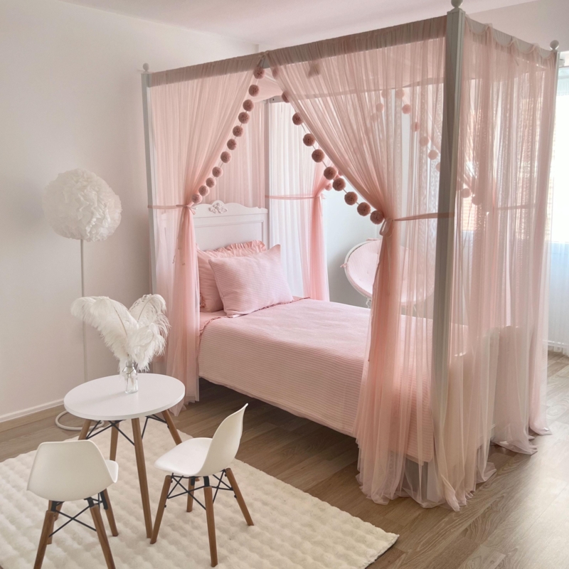 Whimsical Canopy Bed with Sheer Drapes & Pom-Pom Garland