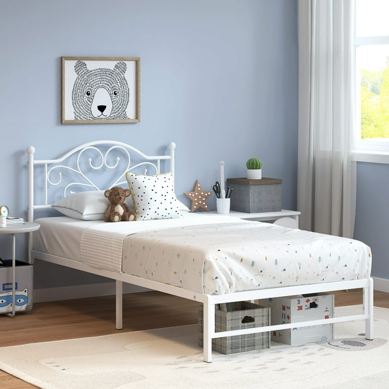 White Metal Twin Bed Frame with Scrolled Heart Motif Headboard.