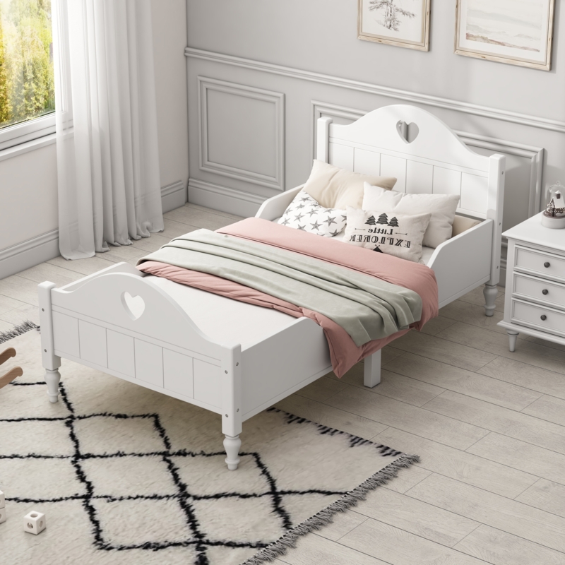 White Toddler Bed with Heart Cutout Details and Safety Side Rails