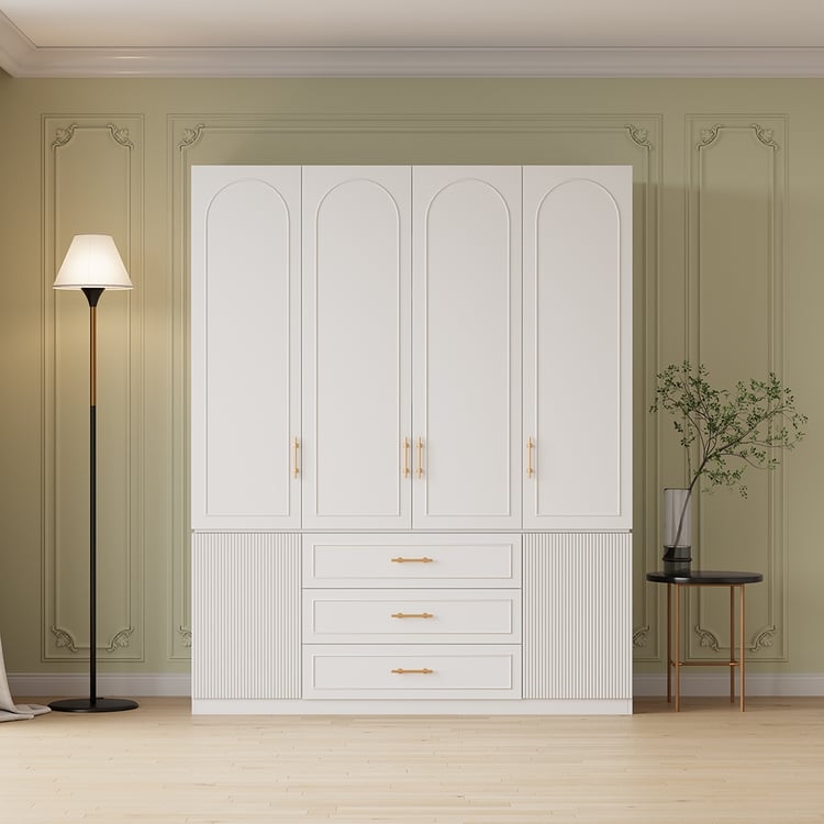 Wide Bedroom Armoire featuring Arched Door Molding and Fluted Panels