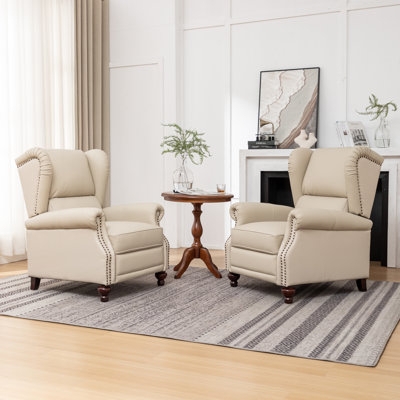 Wingback Recliner Cream Leather Like Push Back Nailhead