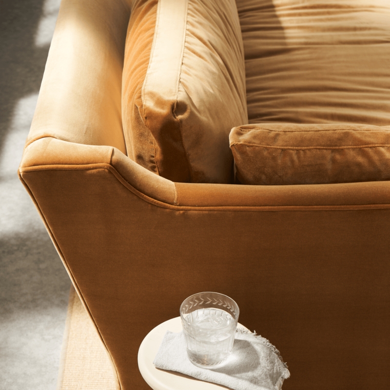 Amber Velvet Sofa with Curved Arms and Welted Seams Detail