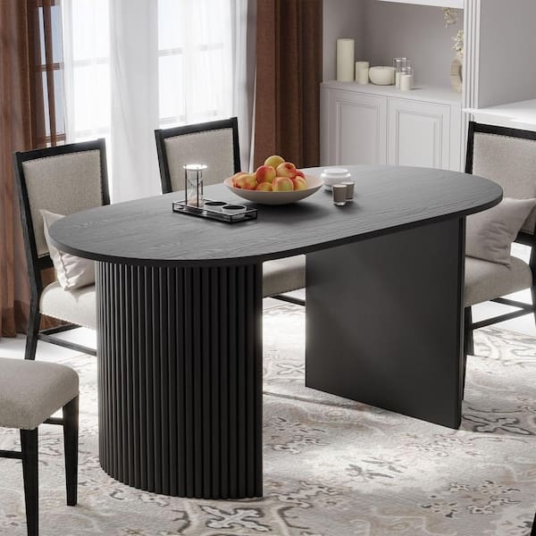 Architectural Oval Dining Table with Asymmetric Fluted Base