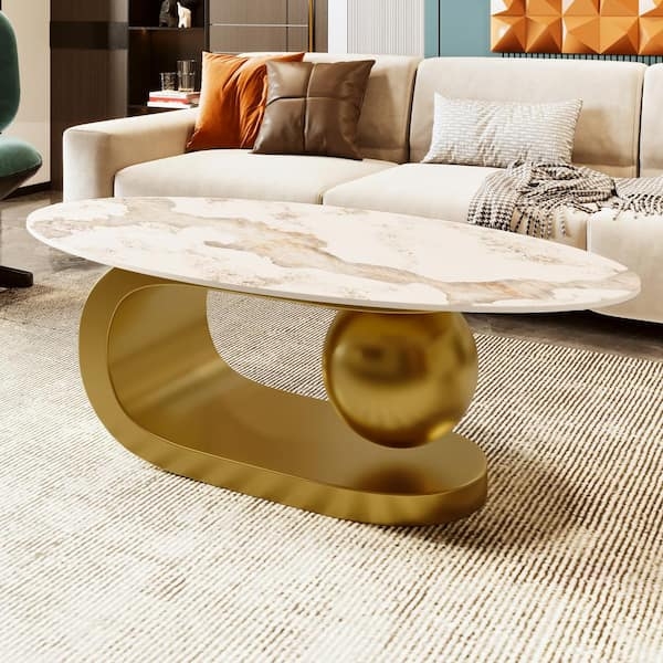 Artistic Coffee Table Design Oval Stone Top Gold C Shaped Leg Sphere
