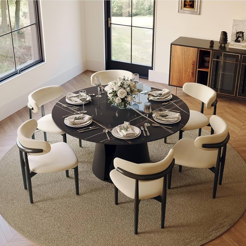 Black Marble Top Round Dining Table with Gold Veining and Pedestal Base