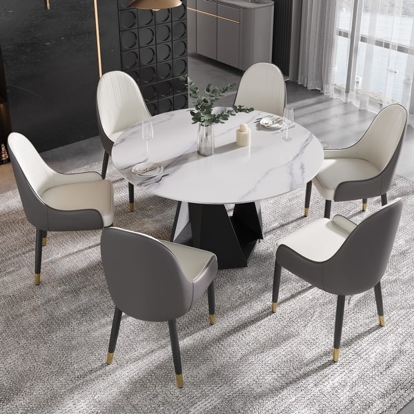 Black Pedestal Dining Set with Geometric Base and Two-Tone Chairs