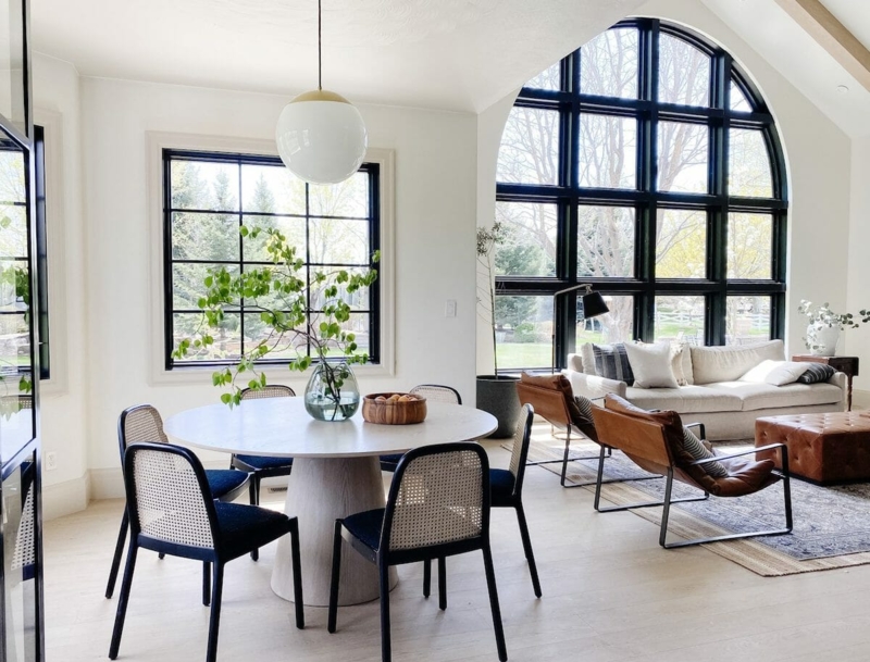 Breakfast Nook Arched Window Black Frame Cane Chairs Airy Modern