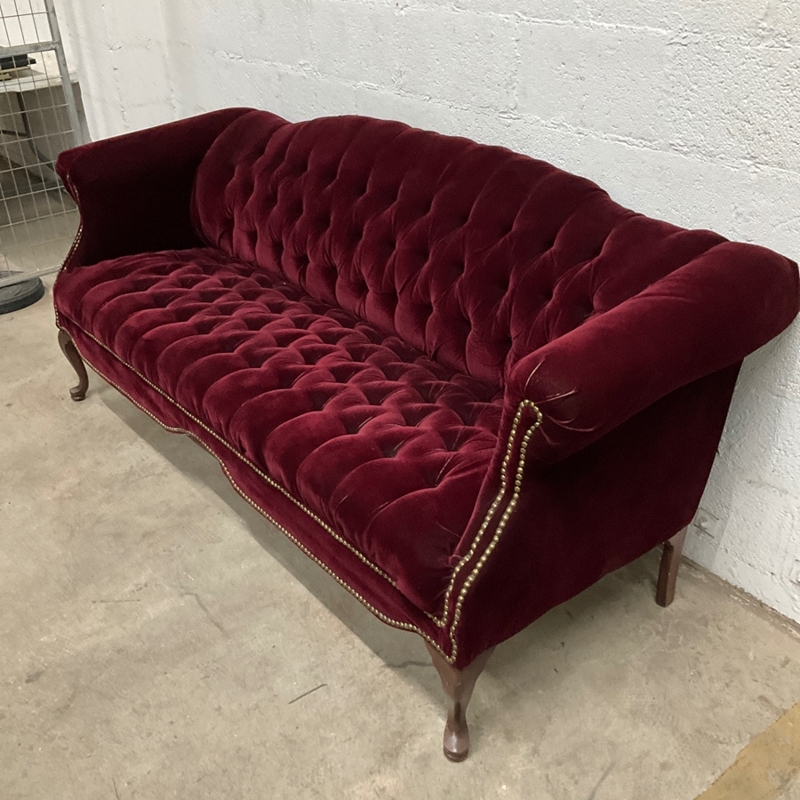 Burgundy Velvet Settee featuring All-Over Tufting and Brass Trim
