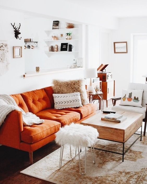 Burnt Orange Sofa with Tufted Seat and Tapered Legs