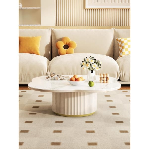 Cloud Shaped Coffee Table White Ribbed Pedestal Base Stone Look