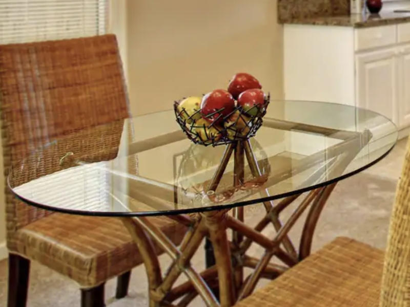 Coastal Oval Dining Table, Glass Top with Bamboo-Style Base