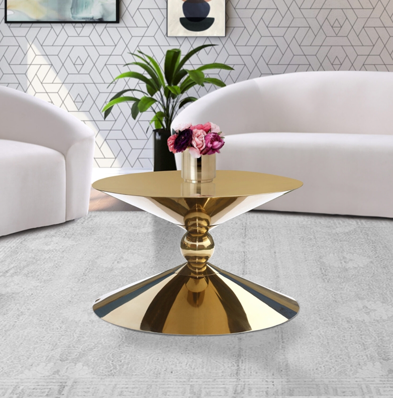 Coffee Table with Polished Gold Cross-Base. Glam round gold coffee table.