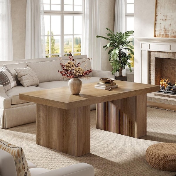 Coffee Table with Ribbed Pedestal Legs and Warm Wood Finish