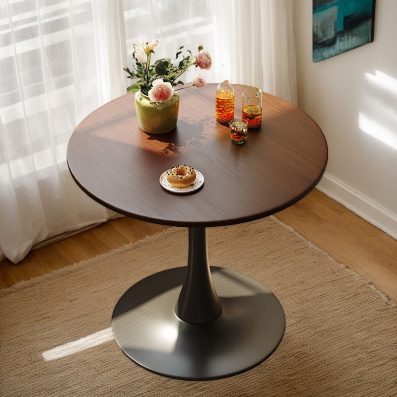 Compact Round Dining Table with Black Trumpet Pedestal Base