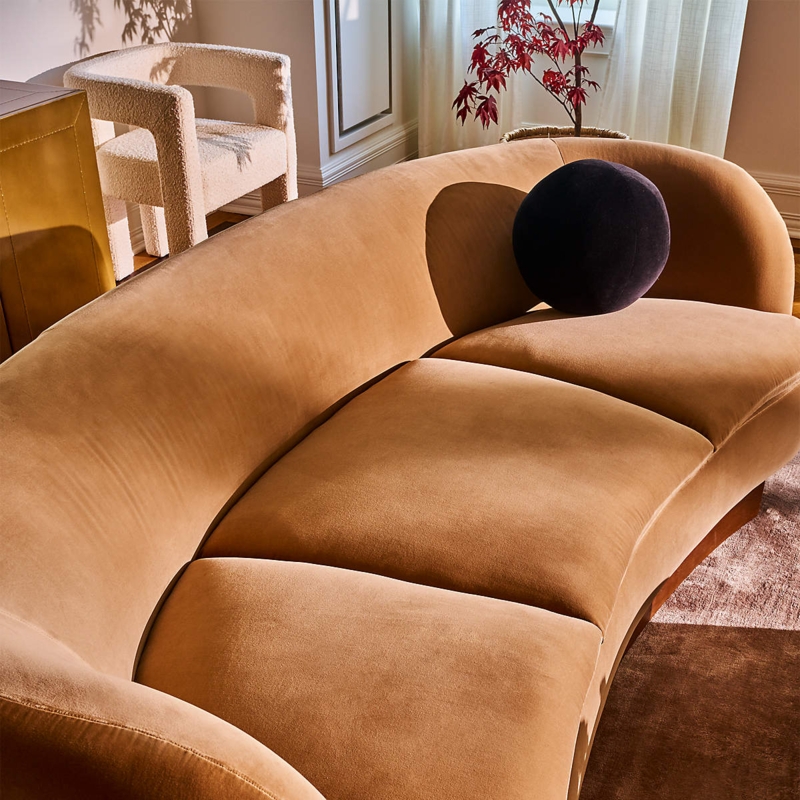 Curved Sofa in Camel Velvet with Integrated Arms