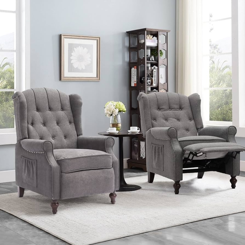 Dark Grey Wingback Recliner featuring Button Tufting and Nailhead Trim