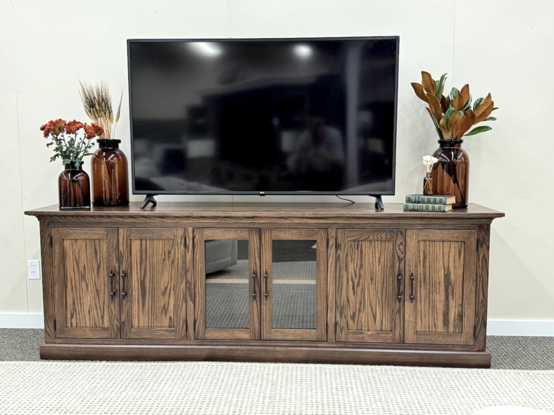 Dark Wood Media Console with Six Door Storage and Amber Glass Accents
