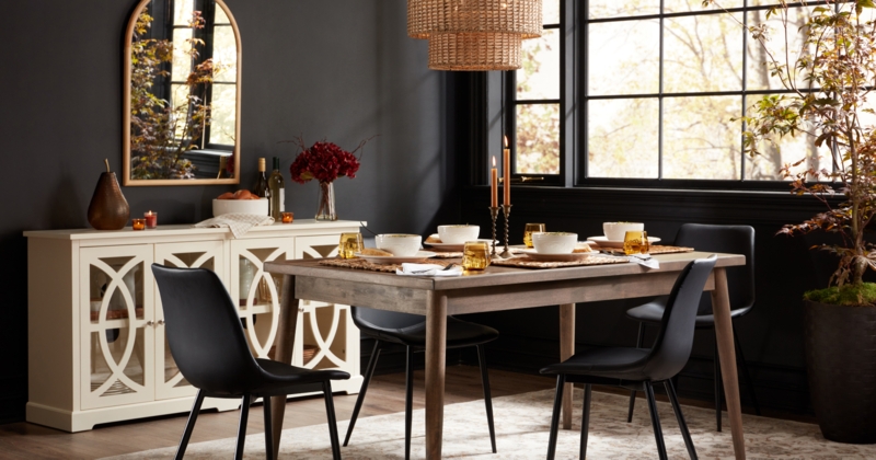 Dining Room: Moody Charcoal Walls with Cream Fretwork Sideboard.