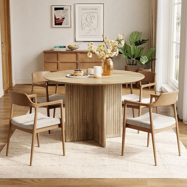 Dining Table Ribbed Pedestal Base Light Wood Curved Back Chairs
