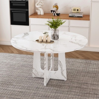 Dining Table Round White Cross Pedestal Base Arched Cutouts Marble Pattern