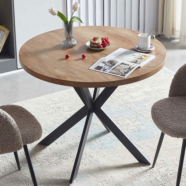 Dining Table with Boucle Chairs and Splayed Metal Legs
