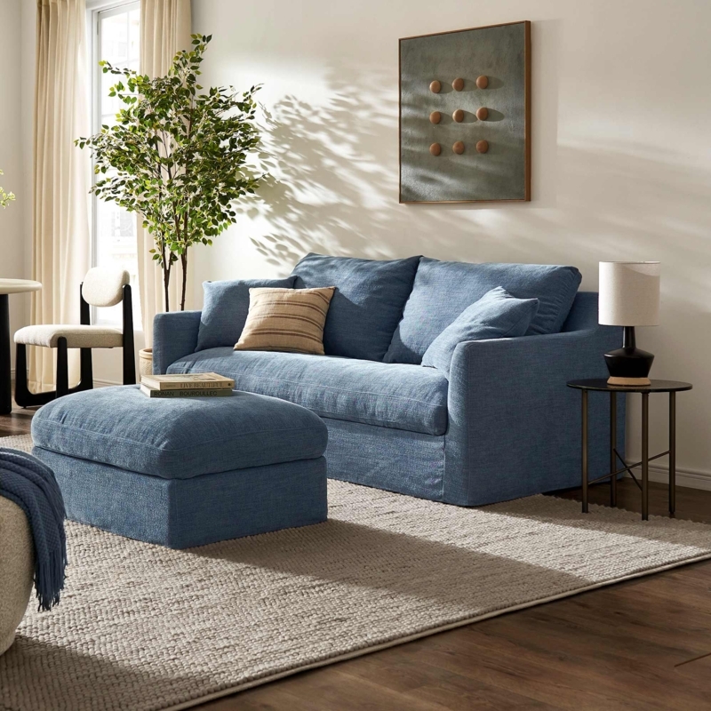 Dusty Blue Slipcovered Sofa with Skirted Silhouette