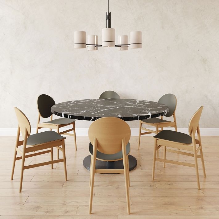 Extra Large Round Dining Table with Veined Stone Top and Dark Base