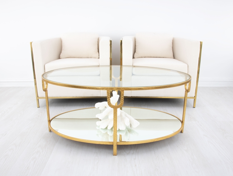 Glam Oval Coffee Table featuring a Mirrored Shelf and Hammered Finish