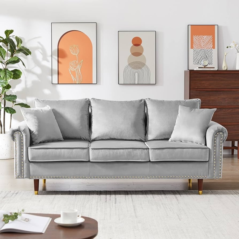 Grey Velvet Sofa featuring Rolled Arms and Gold Capped Legs