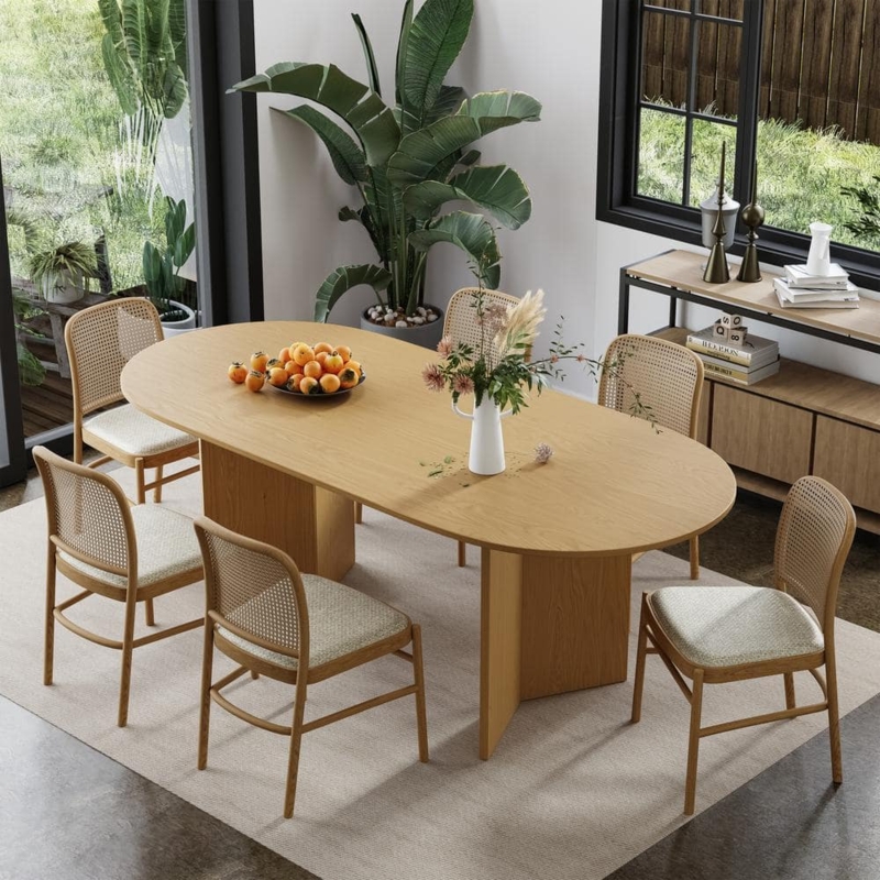 Japandi Oval Dining Table with Double Pedestal Base and Cane Chairs