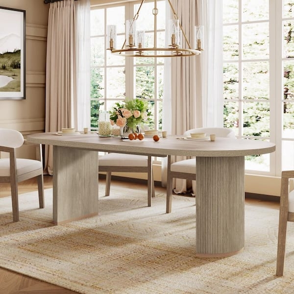 Light Ash Wood Oval Dining Table with Unique Asymmetrical Fluted Base