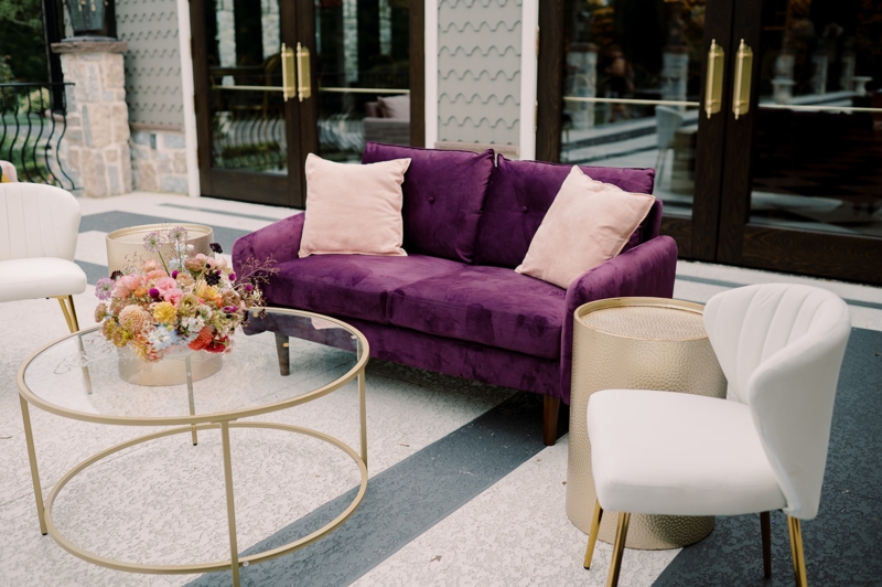 Loveseat Jewel Tone Upholstery Gold Metal Accents Tapered Legs