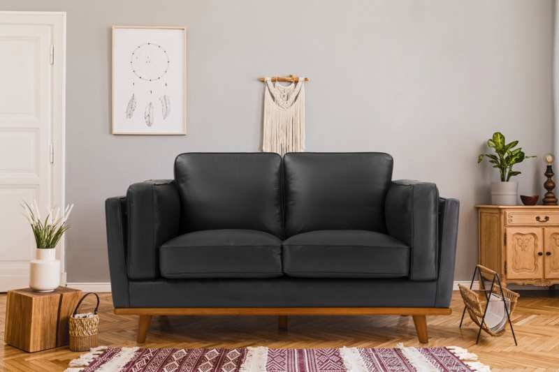 Loveseat Leather-Like Tapered Legs Flared Arms Top Stitching