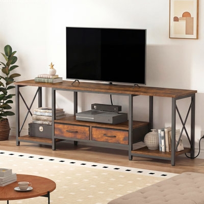 Metal frame media console with drawers and charcoal accents.
