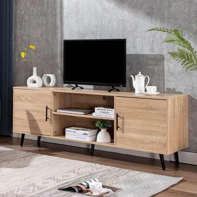 Mid-century modern TV stand in light oak with tapered legs.