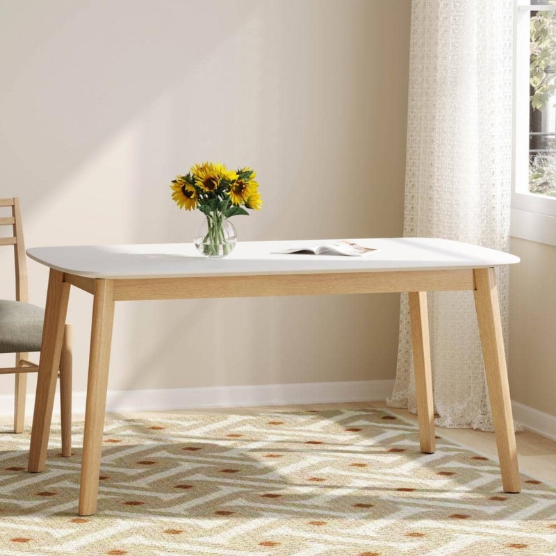 Minimalist Dining Table with White Top and Tapered Oak Legs