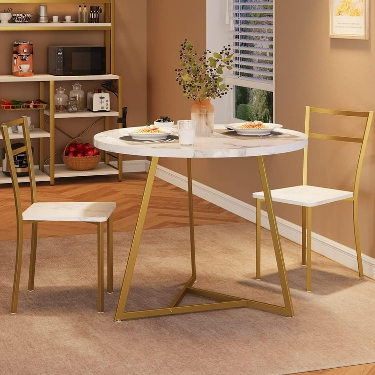 Minimalist Gold Metal Kitchen Table Set with Tripod Base and Marble Top.