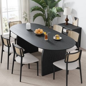 Modern Farmhouse Dining Set with Black Oval Table and Cane Chairs