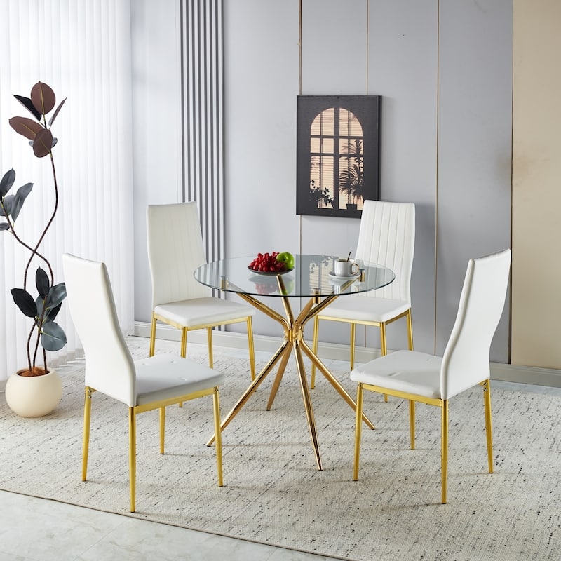 Modern Glam Dining Set: Round Glass Table, Gold Splayed Legs, White Chairs